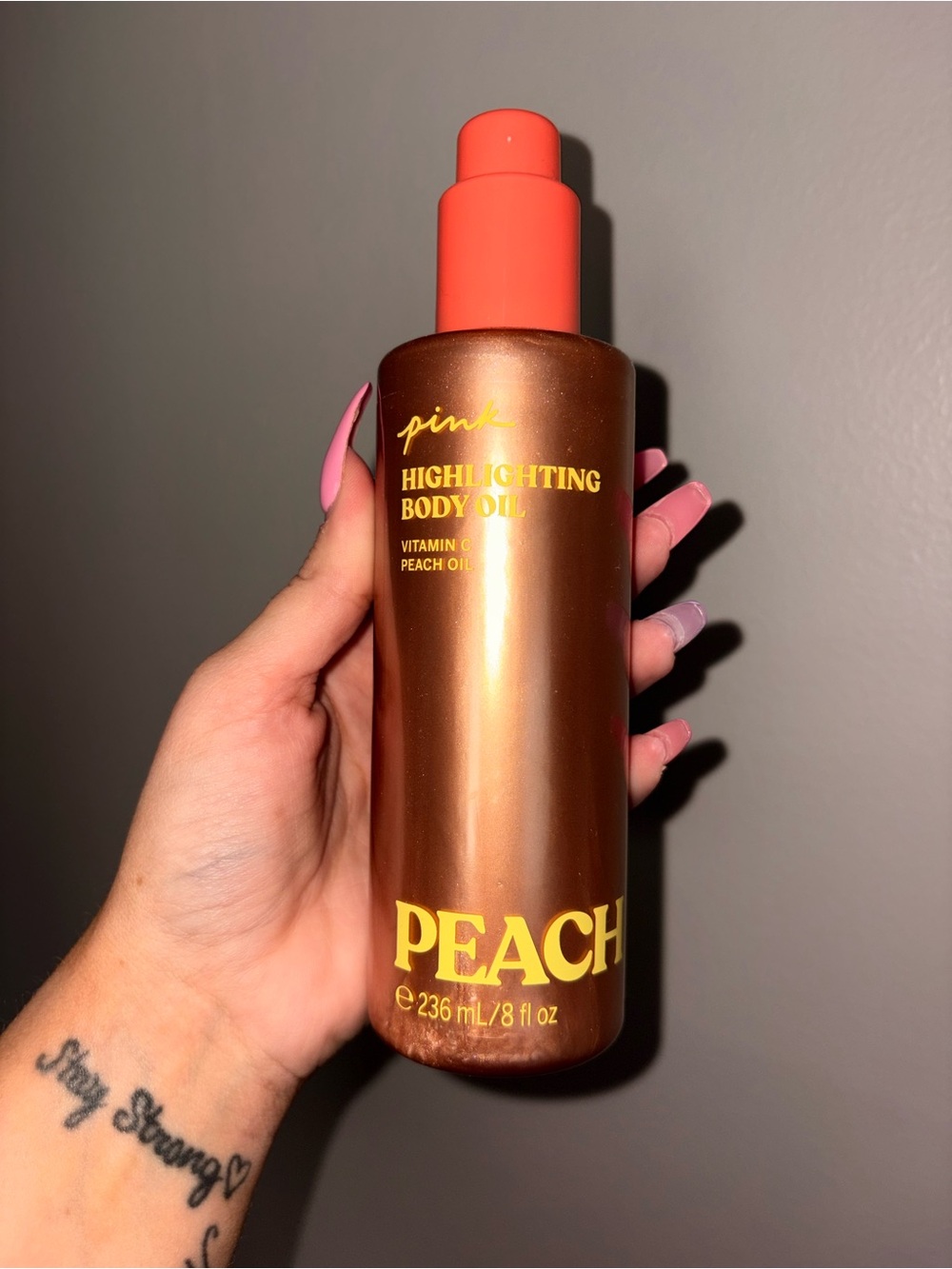 PINK Victoria's Secret Highlighting Body Oil - Copper Bottle with Coral Cap